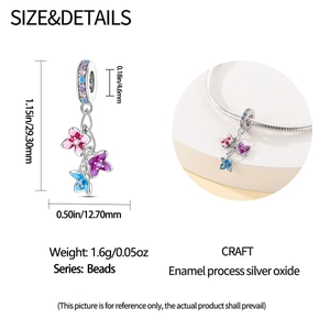 Macro view of floral pendant bead showing detailed size measurements and enamel petals