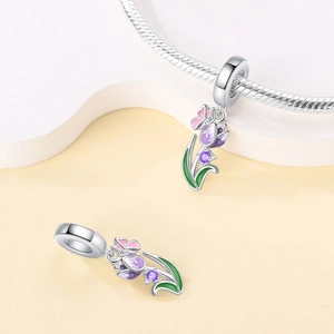 Silver tulip charm with purple enamel and butterfly detail for charm bracelets