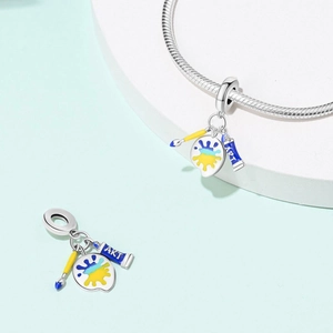 Artistic painter palette and brush charm pendant on silver snake chain bracelet