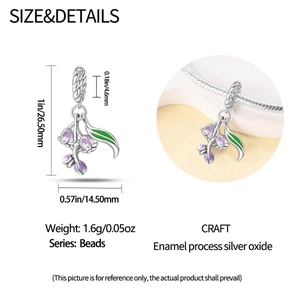 Detail of tulip charm bead with purple enamel and dimensions of 26.50mm by 14.50mm