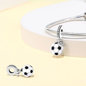 Detailed soccer ball charm with black and white enamel and heart engraved ring bail