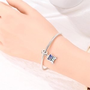 S925 silver snake chain bracelet featuring a square blue oil painting style pendant