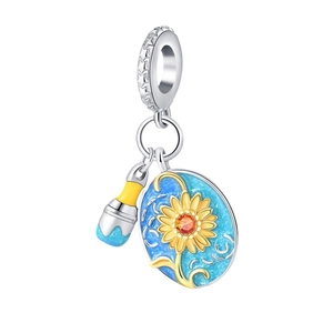 Artistic sunflower palette charm with paintbrush pendant in blue enamel and silver plating