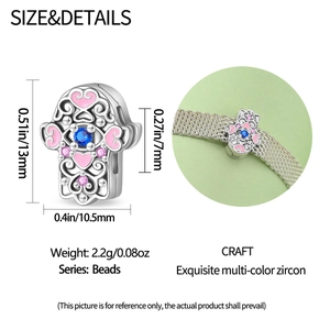 Detailed view of silver Hamsa charm with pink enamel and blue zircon for DIY bracelets
