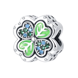 Silver four-leaf clover charm bead with green enamel and sparkling cubic zirconia stones