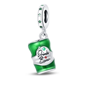 Macro shot of silver beer can charm with green enamel and Drink Beer inscription
