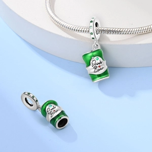 Detail of silver beer can charm with green enamel and Drink Beer engraving on bracelet