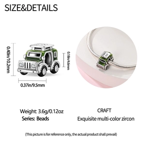 Detail of silver off-road car bead with green enamel and JUST GO text for bracelet