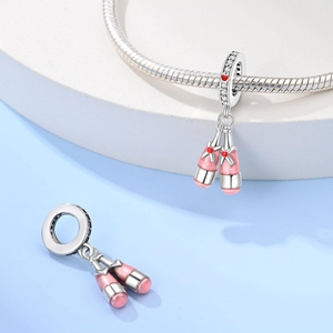 Detail of 925 silver pink ballet slippers charm with heart enamel and zircon