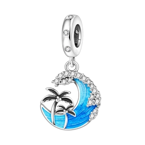 Detailed view of ocean charm with blue wave enamel, coconut tree and clear zircons