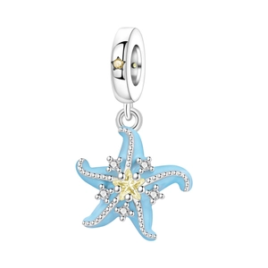 Close-up of starfish charm with blue enamel and yellow star zircon for DIY bracelets