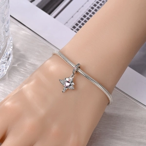 Zilveren slangenketting armband met medische engel bedel en roze hart zirkonia