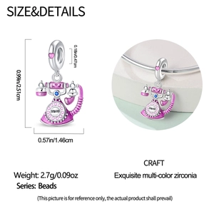 Detail of pink enamel telephone charm with Hallo text and colorful cubic zirconia