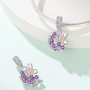 Silver butterfly floral charm with pink enamel and purple zircons on snake chain