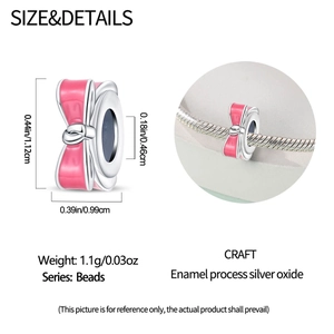Pink enamel bow charm with silver finish, dimensions 1.12cm x 0.99cm for DIY bracelets