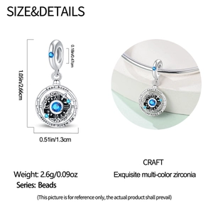 Macro detail of bead charm with blue stones and heart universe engraving