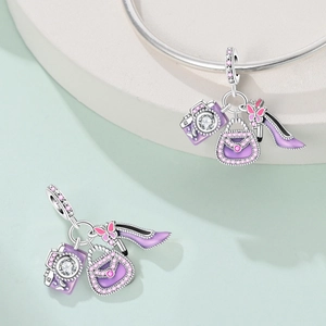 Silver camera, handbag, and high heel charms with lavender enamel and zircon accents