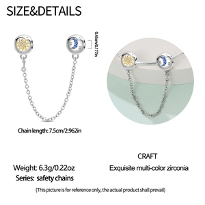 Detail of silver safety chain with sun and moon zircon charms for beaded bracelets