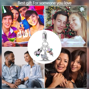 Silver guitar and Eiffel Tower charm pendant with pink enamel and zircon accents