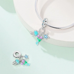 Detailed silver mermaid charm with green tail, shell and blue starfish on snake chain
