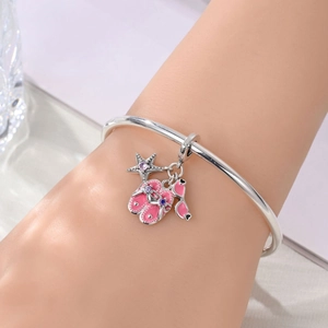 Silver charm bracelet with pink enamel starfish, flip-flops and sunglasses charms