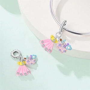 Detail of pink dress and jewelry box charms in S925 silver with enamel finish