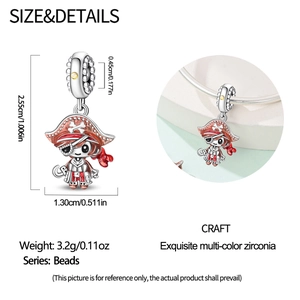 Macro detail of pirate charm with red enamel hat and zirconia for DIY bracelets
