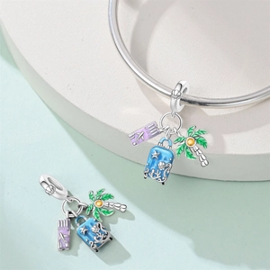 Travel themed S925 silver charm with blue suitcase, plane ticket and palm tree pendants