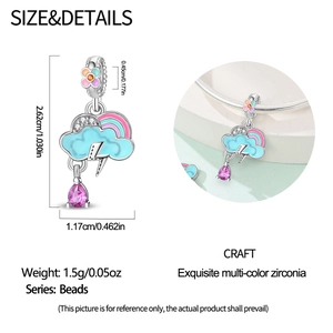 Detailed macro view of cloud and rainbow bead charm with pink crystal teardrop