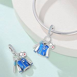 Baseball sports charm with blue jacket, bat, and ball in silver finish and blue zircon