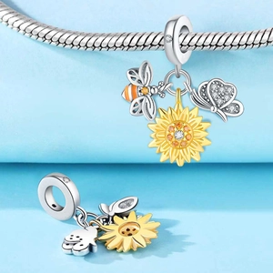 Detailansicht Silberanhänger mit Sonnenblume, Emaille-Biene und Kristall-Schmetterling
