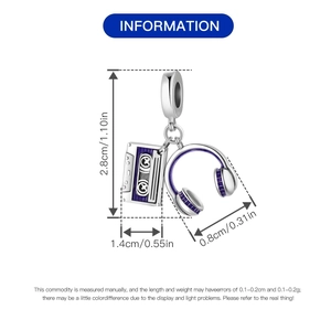 Detailed view of silver music charm with vintage cassette and headphones showing 2.8cm height