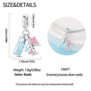Travel theme silver charm with blue boarding pass, silver airplane and pink flower detail