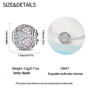 Detailed view of hollow heart bead charm with pink and white cubic zirconia crystals