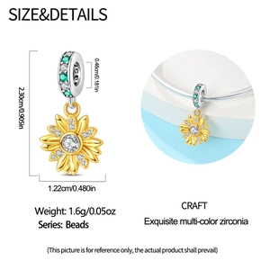 Macro detail of sunflower charm pendant showing dimensions and multi-color zircon stones