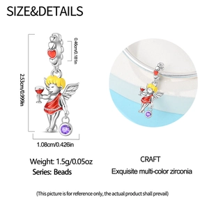Detailed view showing Cupid pendant dimensions of 2.53cm with red enamel and purple zircon