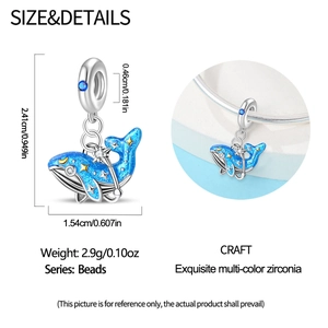 Detailed macro view of S925 silver whale charm with blue enamel and starry night pattern
