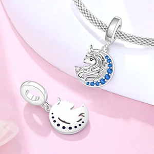 Detail of silver unicorn crescent moon charms with blue zircons for DIY bracelets