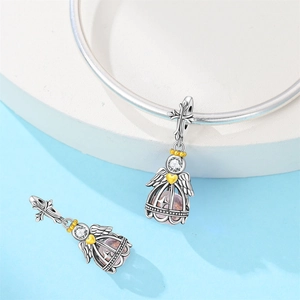 Detail of silver angel wing charm with cross and pink star sand bead for DIY bracelets
