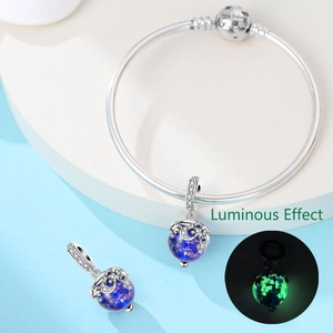 Luminous crescent moon star charm bead on silver snake chain bracelet with glow effect