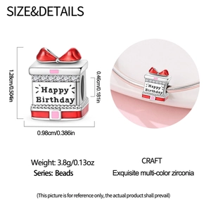 Detail of silver birthday gift box bead with red bow and sparkling zircons for bracelets
