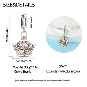 Detail view of crown charm with orange cubic zirconia and size specifications