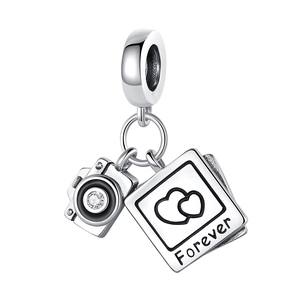 Detail of silver camera and photo frame charm with Forever engraving for bracelets