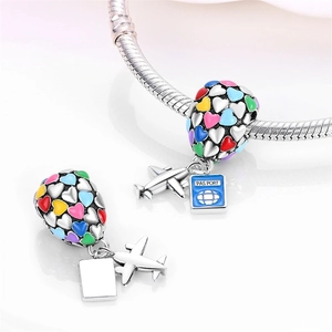 Silver hot air balloon charm with colorful hearts, plane and passport on snake chain