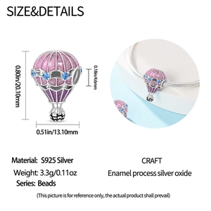 Detail of pink glitter enamel hot air balloon charm with blue zircon for bracelets