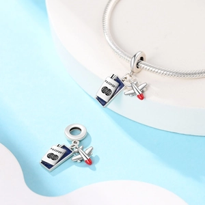 Travel charms detail with blue enamel passport and silver airplane for DIY bracelets