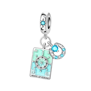 Tarot Wheel of Fortune charm with blue enamel and sparkling crescent moon in S925 silver