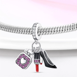 Silver charm pendant set with perfume bottle, lipstick, and high heel on snake chain
