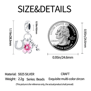 Detailed view of S925 silver lucky charm with pink enamel cherry blossom and zircon stones