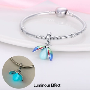 Detailed view of luminous firefly charm pendant with colorful enamel on silver snake chain
